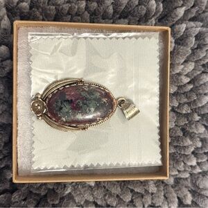 Elegant Gold and Red Pendant